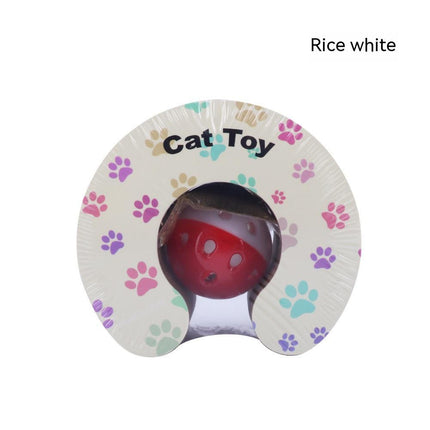 Cat toy with a red ball inside a white packaging featuring paw prints on a white background.